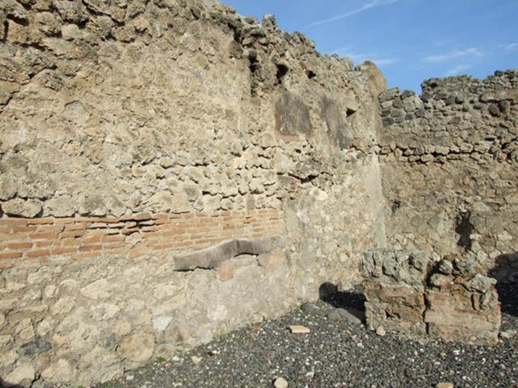 I.3.12 Pompeii.  Shop.  North wall and rear room in north east corner.