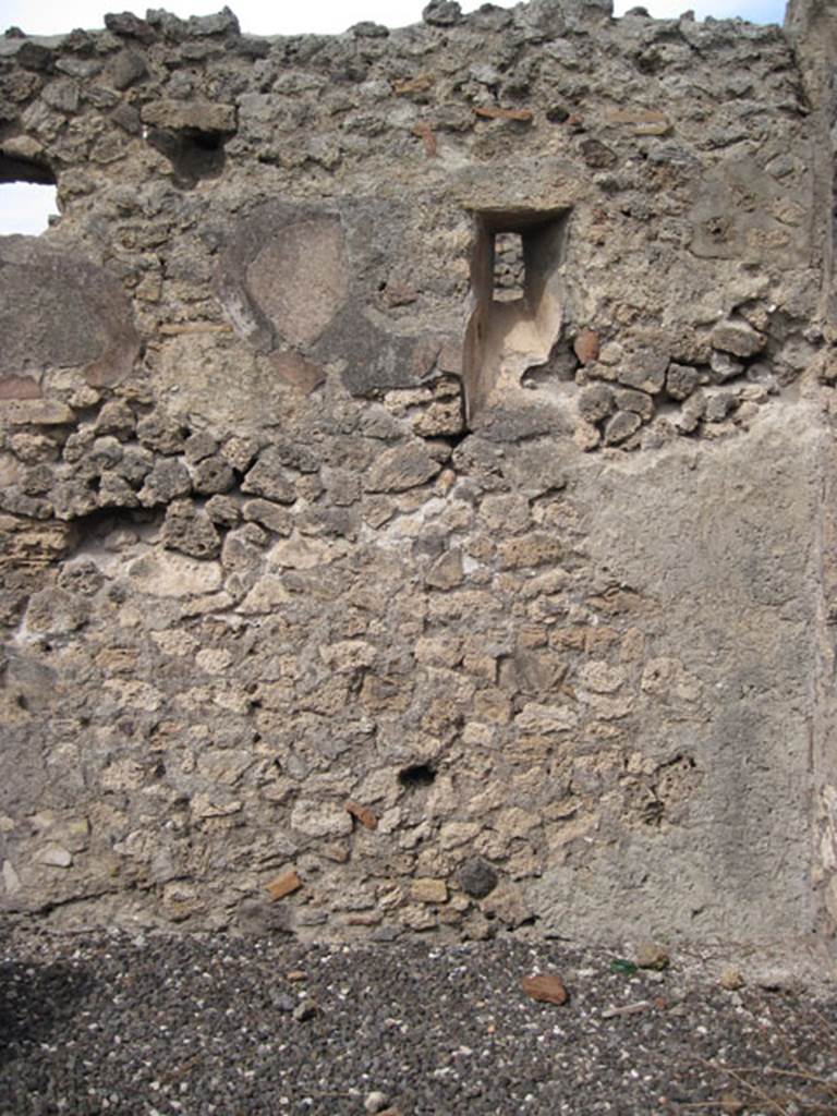 I.3.12 Pompeii. September 2010. North wall in rear room in north-east corner with slit window onto Vicolo del Menandro. Photo courtesy of Drew Baker. According to CTP, when the survey was written  “the north wall of the back room has now vanished”.
See Van der Poel, H. B., 1986. Corpus Topographicum Pompeianum, Part IIIA. Austin: University of Texas. (p.6)
