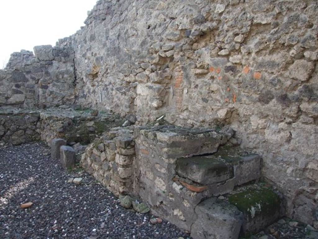 I.3.15 Pompeii. December 2007.  West wall with remains of hearth which would have heated a boiler for washing.
