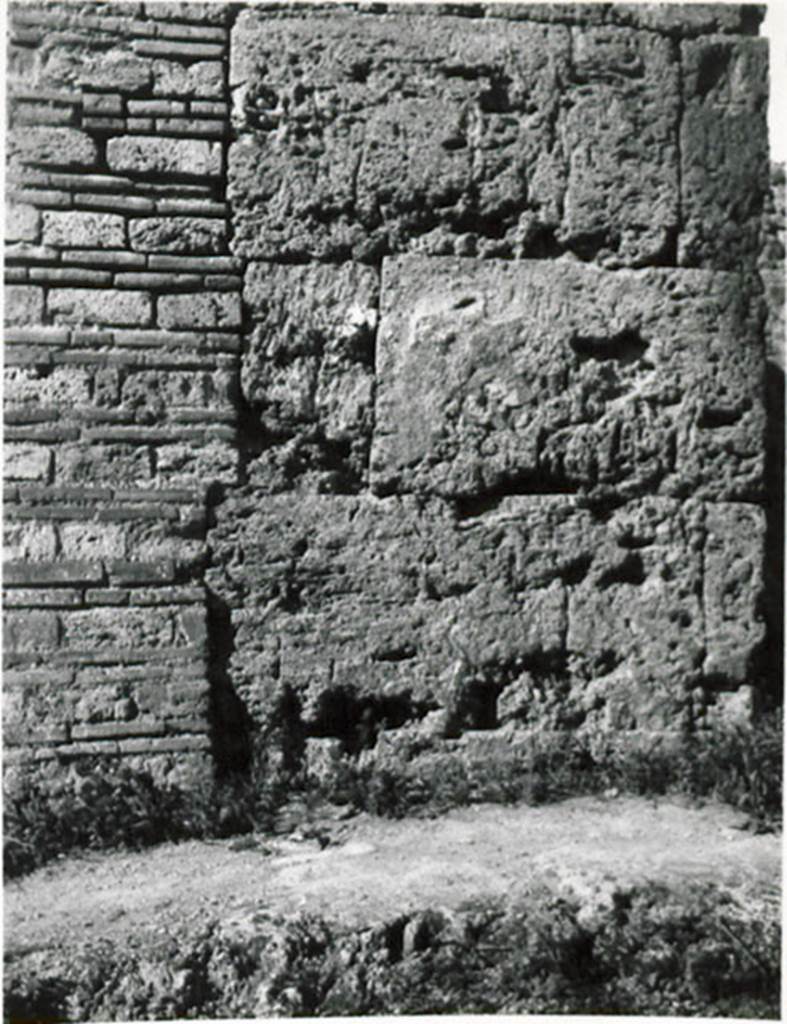 I.3.26 Pompeii. 1935 photograph taken by Tatiana Warscher. A part of the street facade wall on the south side of the entrance doorway. 
See Warscher, T, 1935: Codex Topographicus Pompejanus, Regio I, 3: (no.73), Rome, DAIR, whose copyright it remains.  
