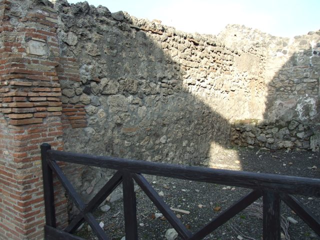 I.4.6 Pompeii. December 2007. East wall of shop,and rear room behind remains of small wall.