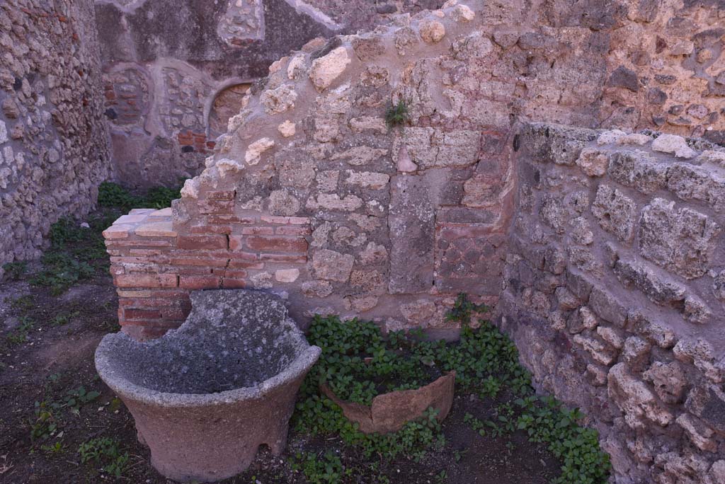 I.4.12 Pompeii. October 2019. Room b, looking south towards wall in south-west corner of bakery room, with doorway to room d, on left.
Foto Tobias Busen, ERC Grant 681269 DCOR.

