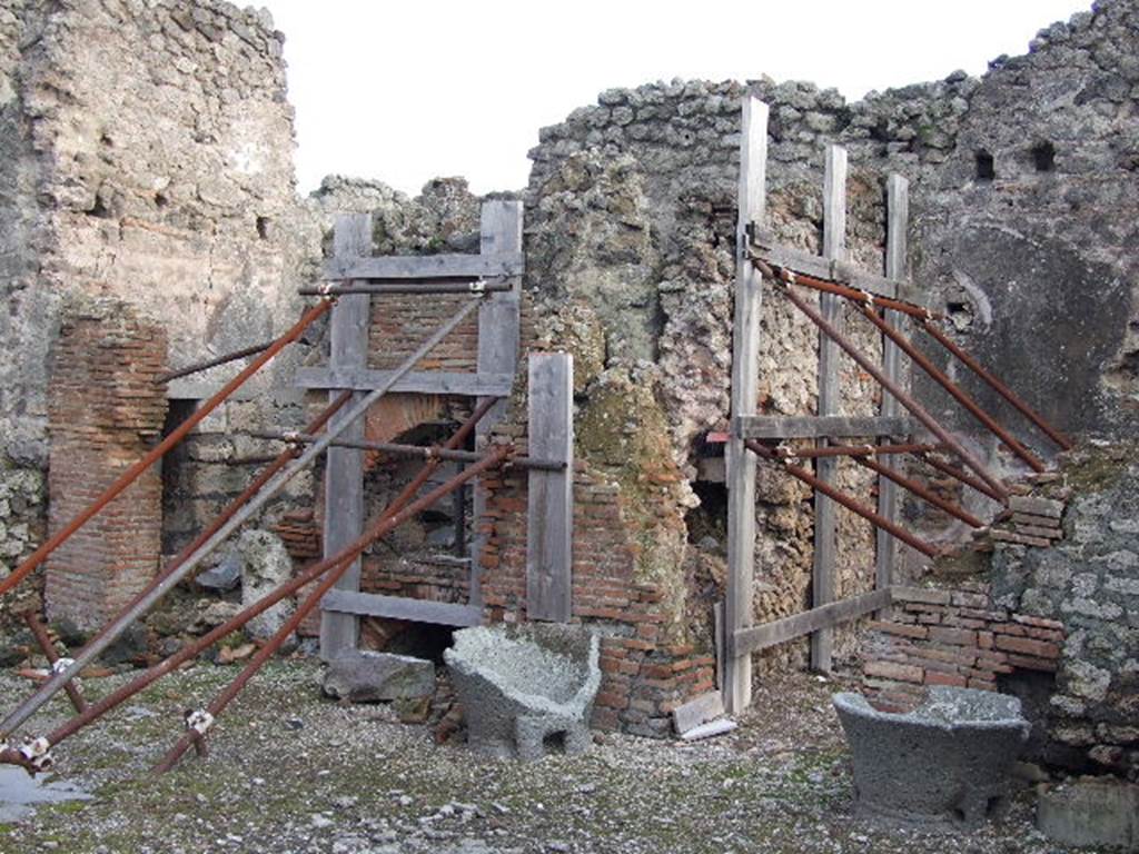 I.4.12 Pompeii. December 2006. Remains of oven, and doorway to room on its west side.