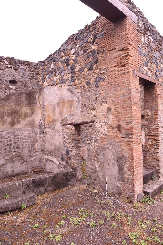 I.4.25 Pompeii. September 2019. 
Room 51, north wall with doorway into room 50, and stairs in atrium.
Foto Tobias Busen, ERC Grant 681269 DCOR.

