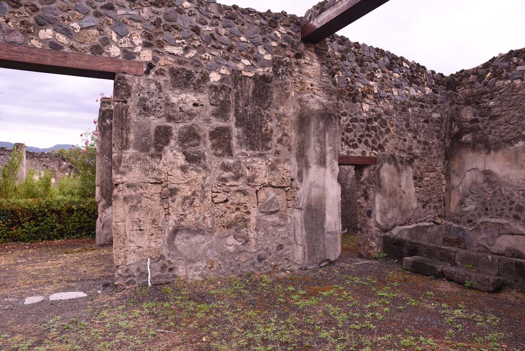 I.4.25 Pompeii. September 2019. 
Room 47, south wall of atrium on west side of doorway to upper peristyle.
The doorway to room 51, is on right, with doorway in south wall into room 52, centre right.
Foto Tobias Busen, ERC Grant 681269 DCOR.
