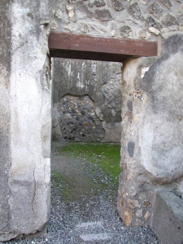 I.4.25 Pompeii. December 2007. Doorway in south wall of room 51, leading into room 52. 