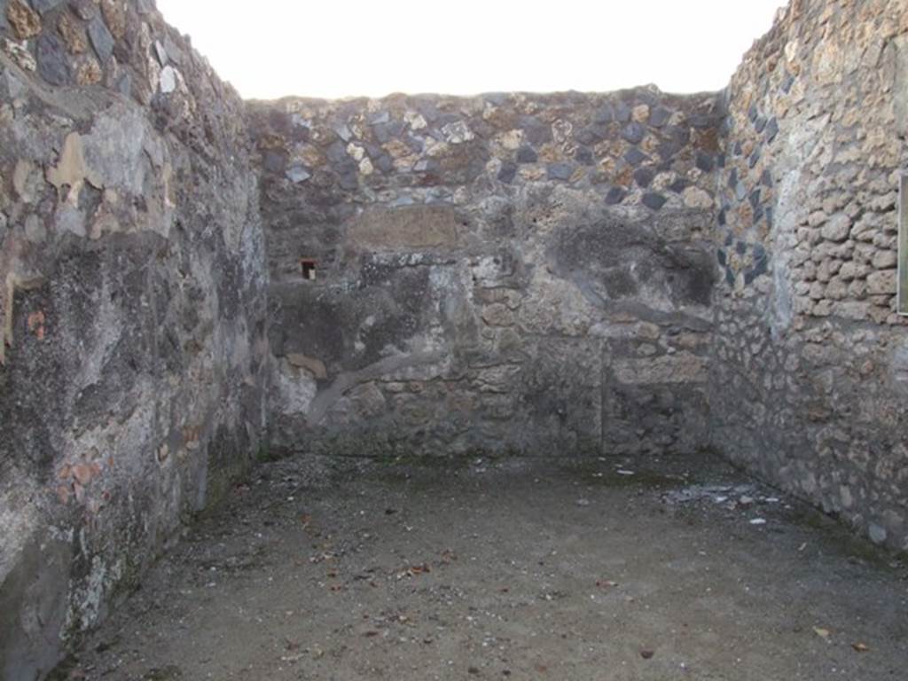 I.4.25 Pompeii. December 2007. Room 37, triclinium on west side of lower peristyle. 
Looking at west wall. The west wall used to have a wall painting of Endymion and Selene.
The south wall used to have a wall painting of Adonis and Aphrodite. 
Both these paintings are now lost. The floor was black and white marble.
There seems to be some confusion as to what was on the south or west walls, see Warscher above.
According to Warscher  on the west wall one cannot see any traces of decoration.
The room gives the impression of total devastation: it was difficult to show that it had been adorned with paintings.
(Sulla parete ovest non si vede nessuna traccia di decorazione.
La stanza da limpressione duna devastazione totale: era difficile rappresentarci che essa fosse adorna di quadri.)
See Warscher, T. 1942. Catalogo illustrato degli affreschi del Museo Nazionale di Napoli. Sala LXXXII. Vol.4. Rome, Swedish Institute
