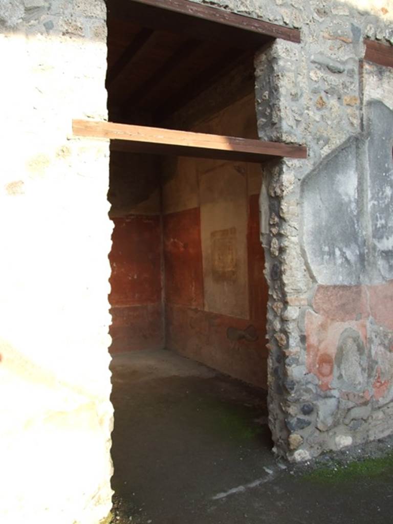 I.4.25 Pompeii. December 2007. Doorway to room 23, in east wall of cubiculum at rear of oecus.