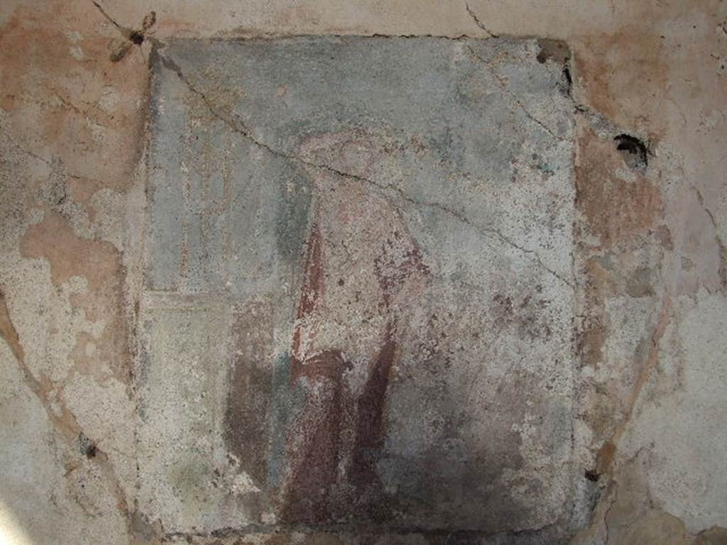 I.4.25 Pompeii. December 2006. 
Room 23, east wall of cubiculum. Remains of a wall painting of Apollo with a plectrum in his right hand above his head. 
The lyre is in his other hand. A base nearby has a tripod on it. 
See Helbig, W., 1868. Wandgemlde der vom Vesuv verschtteten Stdte Campaniens. Leipzig: Breitkopf und Hrtel. (183, p.51).
