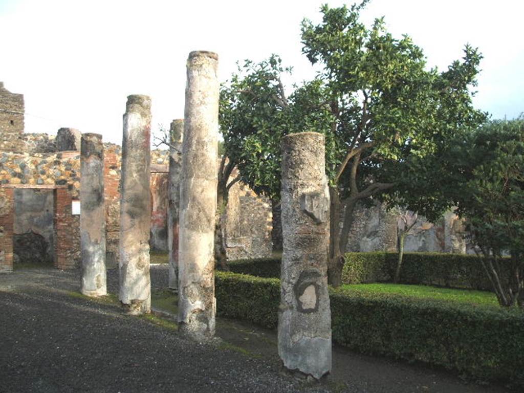 I.4.25 Pompeii. December 2004. Upper peristyle 56, looking south-east along north portico.