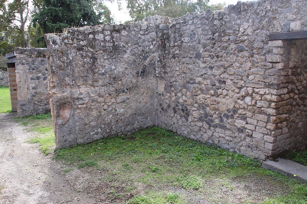 I.5.2 Pompeii. October 2024. 
Looking south-west across shop-room, with doorway to room on west side, on right. Photo courtesy of Klaus Heese.
