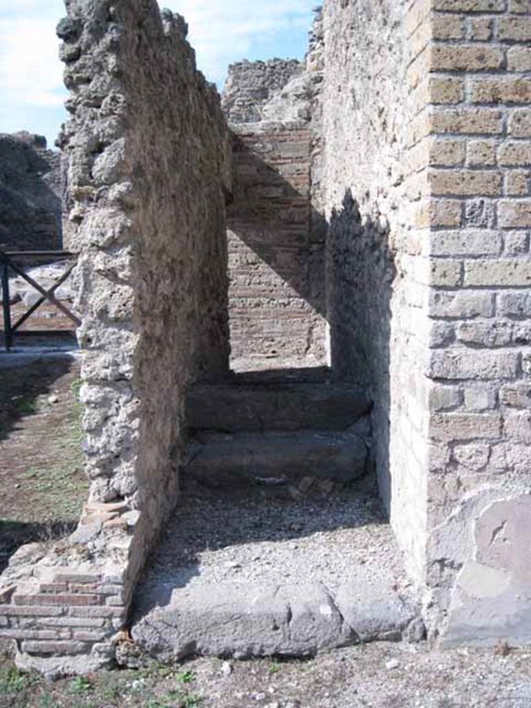 I.5.2 Pompeii. September 2005. Stone base of steps to upper floor.