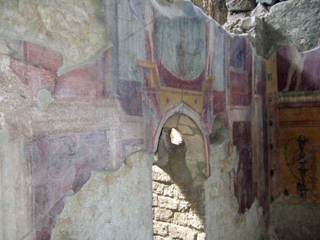 I.6.2 Pompeii. May 2006. Frigidarium, south wall with arched doorway and hole for light.