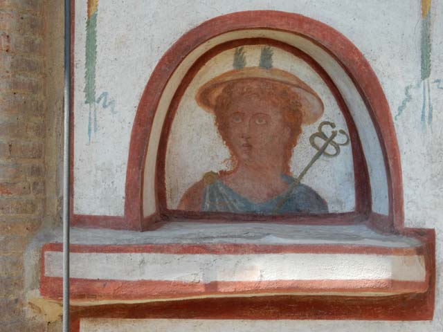 I.6.2 Pompeii. September 2019. Detail of west wall with painted decoration near recess (kitchen) in north wall.
Photo courtesy of Klaus Heese.
