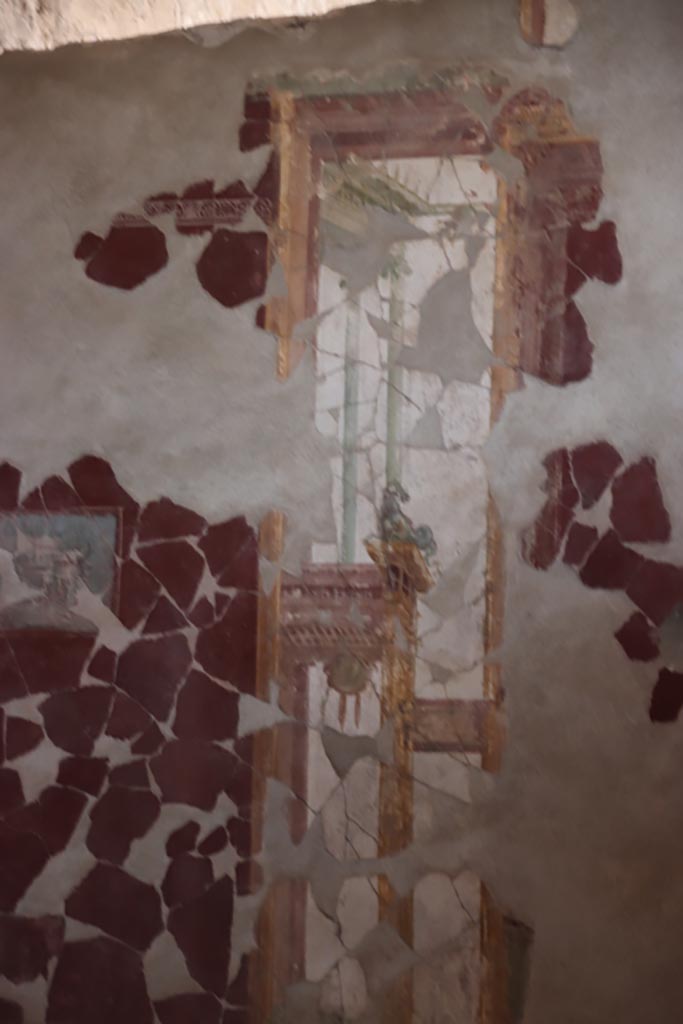I.6.4 Pompeii. October 2022. 
Room 2, detail from north end of east wall. Photo courtesy of Klaus Heese. 

