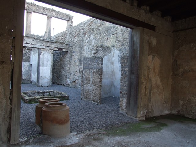 I.6.9 Pompeii. October 2004. Detail from north-west corner of tablinum. Photo courtesy of Nicolas Monteix