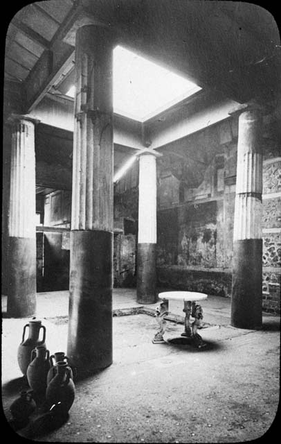 I.6.15 Pompeii. May 2015. 
Room 4, looking north across tetrastyle atrium with terracotta and marble impluvium.
Photo courtesy of Buzz Ferebee.
