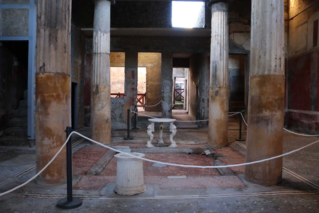 I.6.15 Pompeii. December 2018. 
Looking north-west towards room 9, the small garden. On the left is the doorway to room 8. Photo courtesy of Aude Durand.
