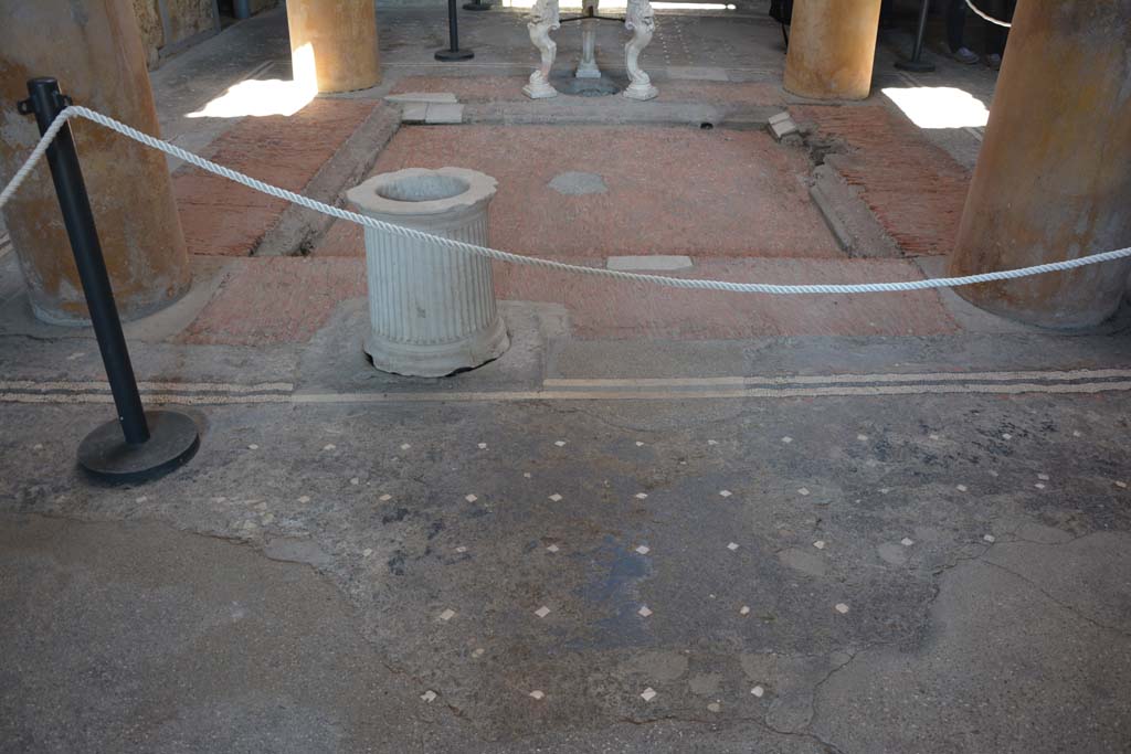 I.6.15 Pompeii. June 2019. Room 9, detail of gutter leading to cistern near small wall on west side.
Photo courtesy of Buzz Ferebee.

