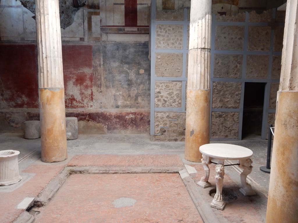 I.6.15 Pompeii. June 2019. Room 4, looking west across impluvium in atrium.
Photo courtesy of Buzz Ferebee.

