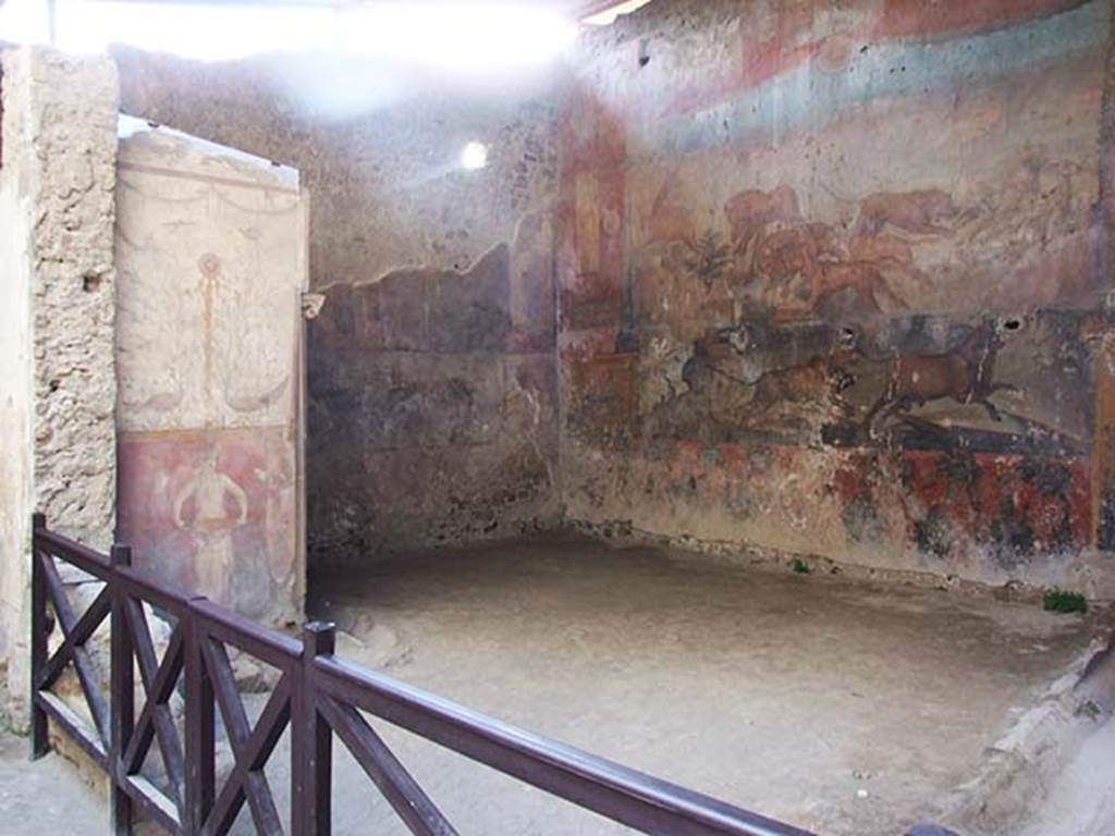 I.6.15 Pompeii. September 2015. Room 12, south-west corner with doorway to atrium in south wall, and the doorway in west wall to corridor, room 7, on right.
