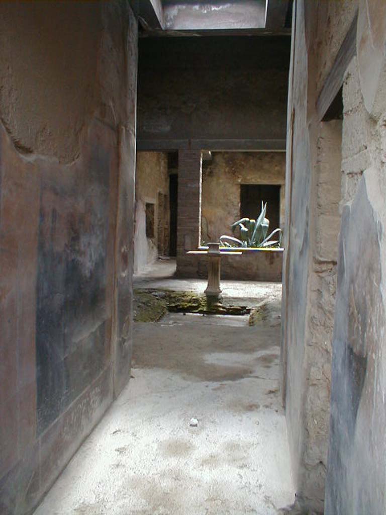 I.7.3 Pompeii. September 2004. Looking south along corridor leading to atrium.