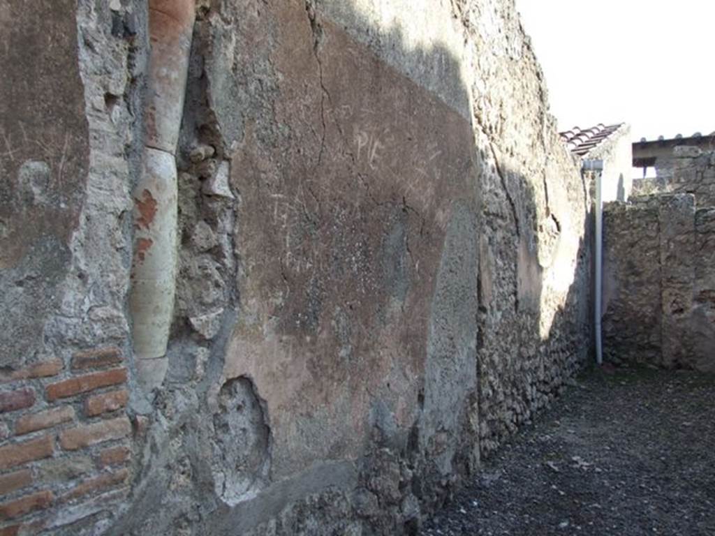I.7.4 Pompeii. December 2007. East wall, with downpipe in north-east corner. 