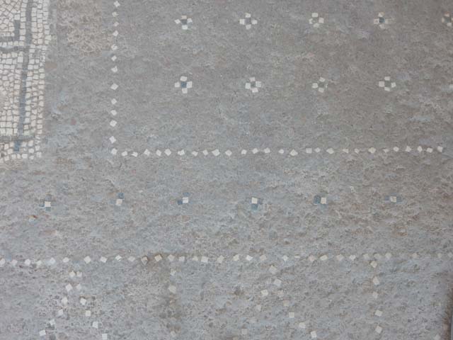 I.7.11 Pompeii. May 2017. Detail of flooring in exedra. Photo courtesy of Buzz Ferebee.

