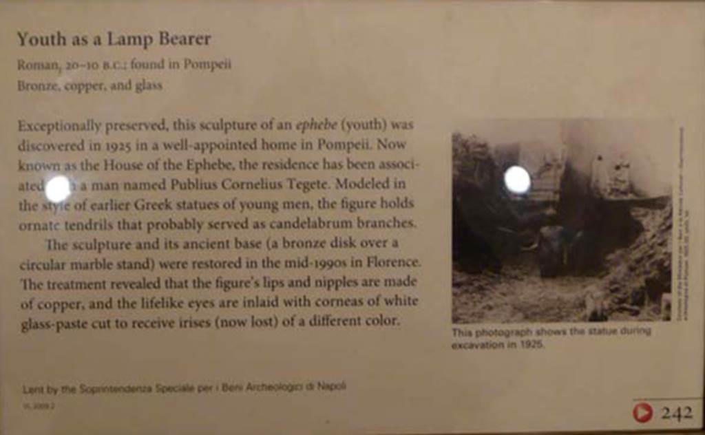 I.7.11 Pompeii. 2010. Getty Museum card describing the bronze statue of the ephebo. 
Photo courtesy of Buzz Ferebee.
