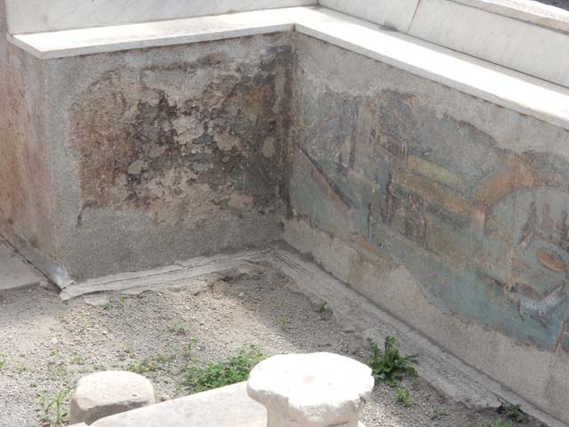 I.7.12 Pompeii. May 2017. Painted panel on inside of west side of summer triclinium at south end. Photo courtesy of Buzz Ferebee.

