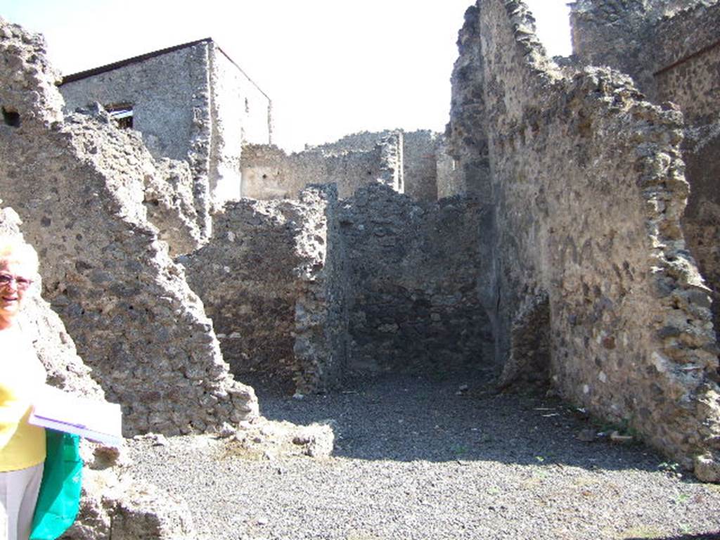 I.7.17 Pompeii. September 2005. Looking east across workshop and rear rooms.