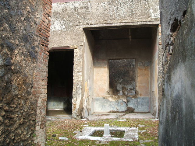 I.7.19 Pompeii. December 2004. Looking east across atrium and impluvium.