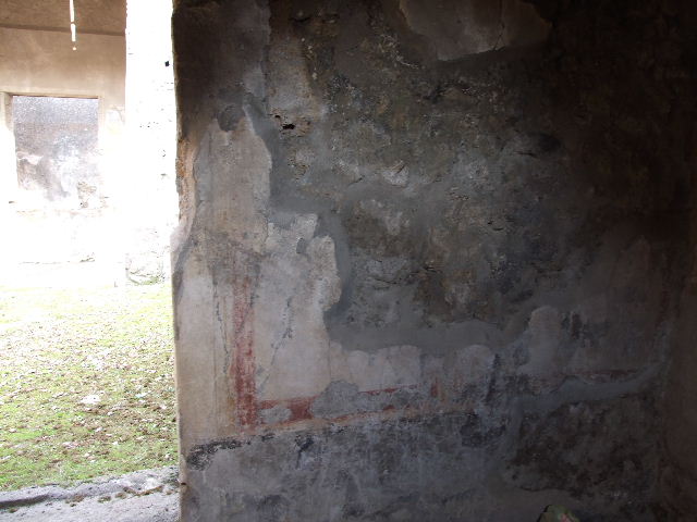 I.7.19 Pompeii. December 2006. East wall and door to atrium in cubiculum in south-west corner of atrium.