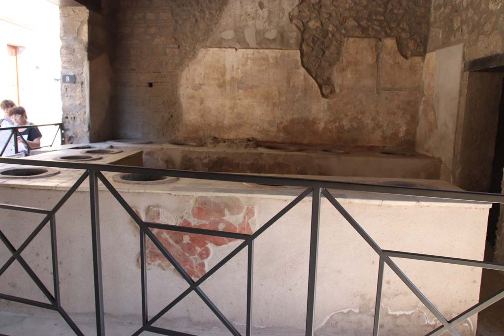 I.8.8 Pompeii. September 2017. Looking across three-sided counter towards east wall. Photo courtesy of Klaus Heese.