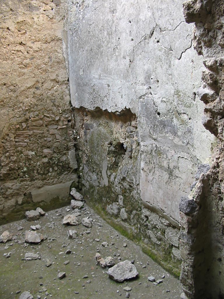 I.8.15 Pompeii. May 2003. 
Looking towards north-east corner and remains of bed recess in east wall. Photo courtesy of Nicolas Monteix.
