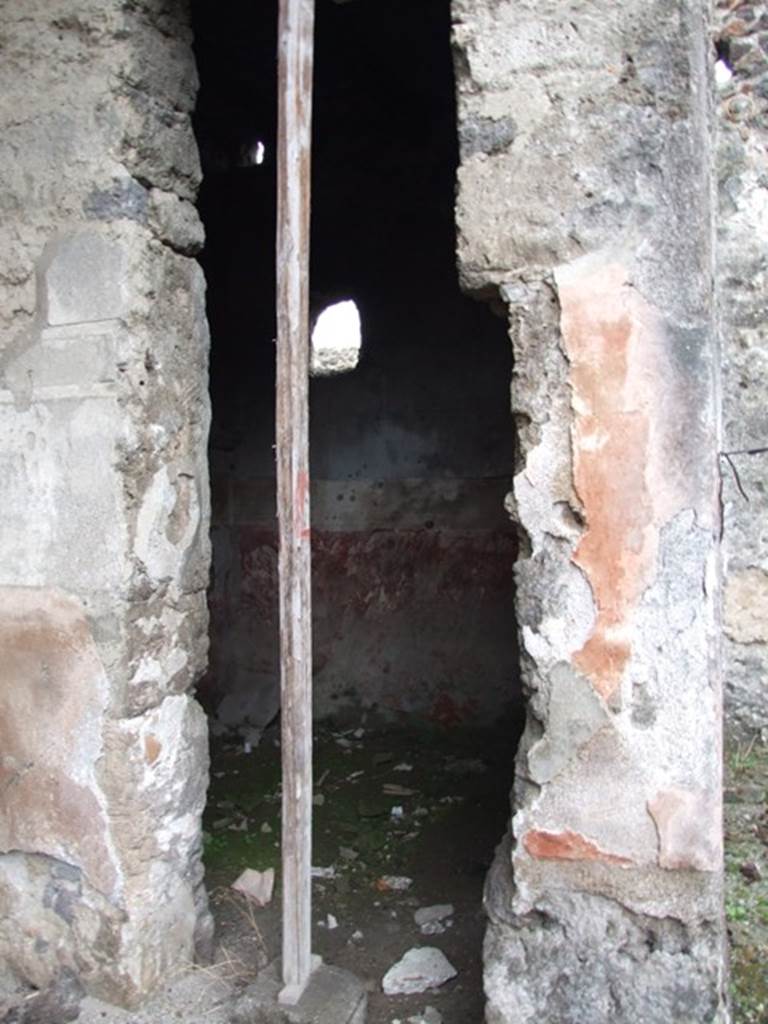 I.8.18 Pompeii. December 2007. Looking west through doorway of room to south of the entrance.