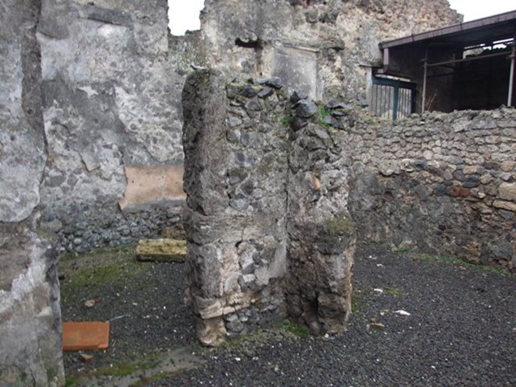 I.8.18 Pompeii. December 2007. Remains of room to north of the entrance with two doorways.