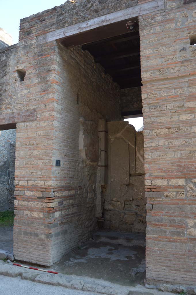 1.9.1 Pompeii. December 2018. East wall of vestibule, with remains of wall painting of Mercury and Hercules. 
Hercules stood to the left and in the right of the painting is Mercury.  Photo courtesy of Aude Durand.
