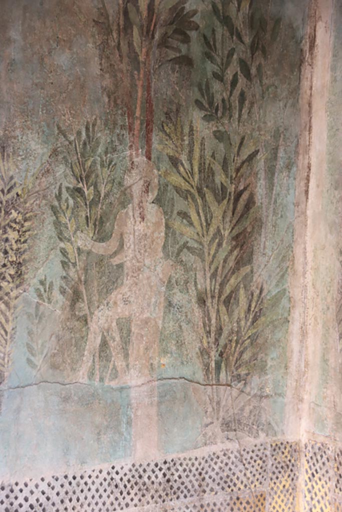 I.9.5 Pompeii. October 2022. 
Room 5, detail of painted figure at east end of north wall. Photo courtesy of Klaus Heese.


