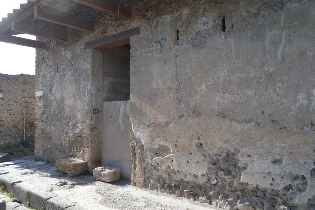 I.9.13 Pompeii. December 2018. 
Looking north-east towards entrance doorway on north side of Via di Castricio. Photo courtesy of Aude Durand.
