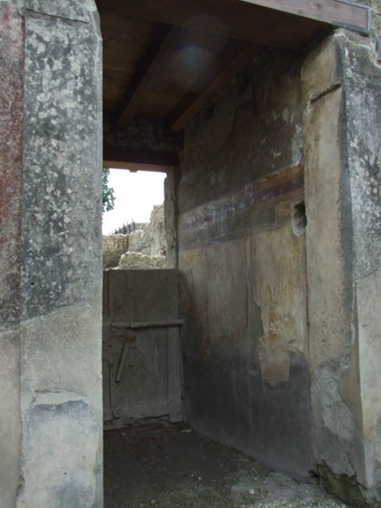 I.9.14 Pompeii. March 2009.  Room 14. West wall of fauces, and plaster cast of inside of front door to I.9.13
