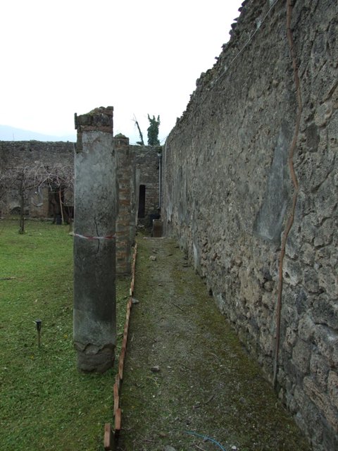 I.9.14 Pompeii. March 2009.  Room 1. Upper garden area. Remains of colonnaded portico on west side of upper garden area.