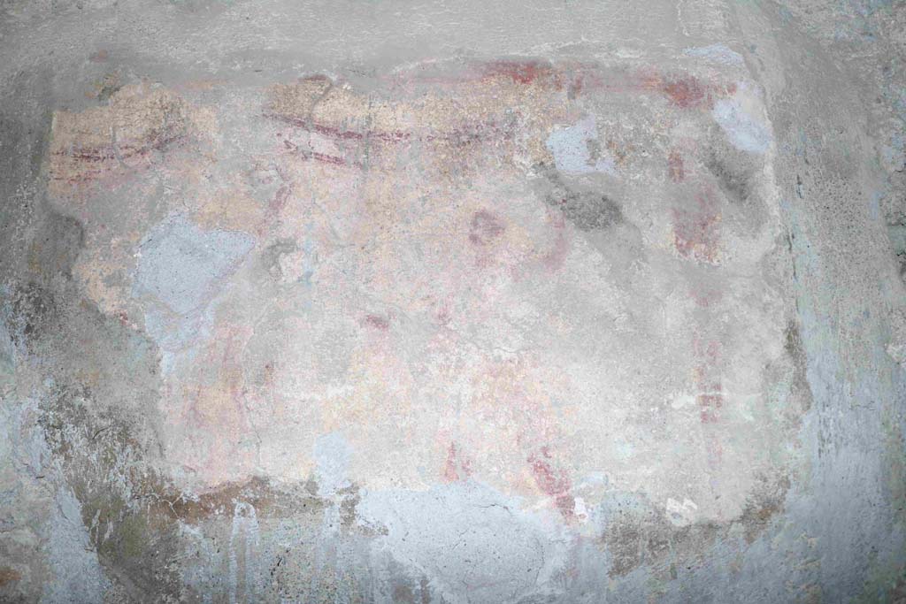 I.10.1 Pompeii. December 2018. Detail of remaining painted lararium from north wall of atrium. Photo courtesy of Aude Durand.