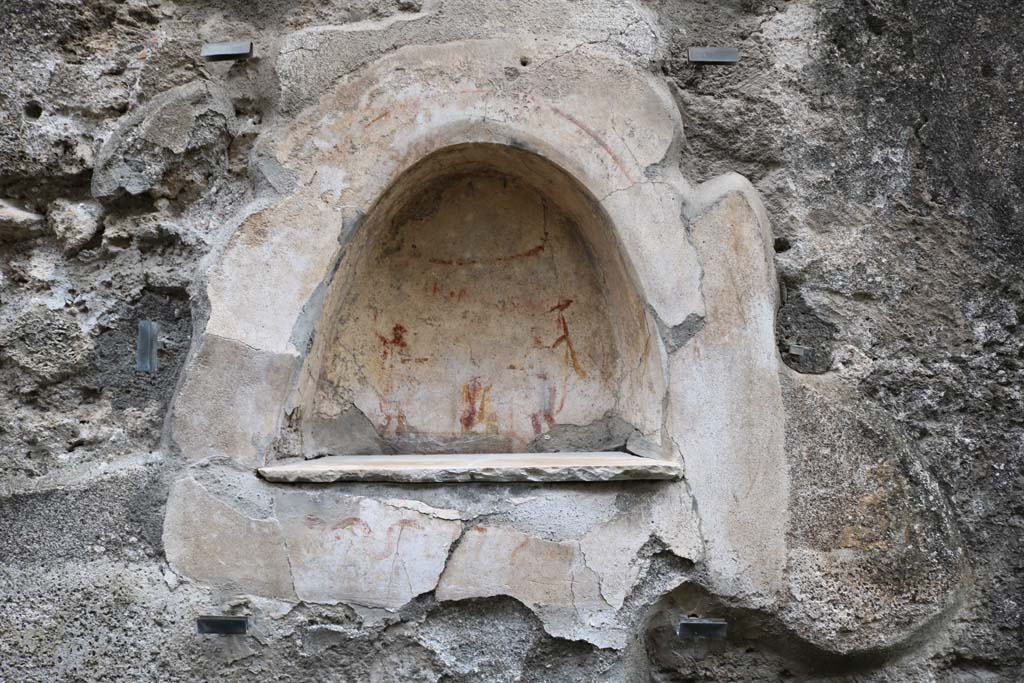I.10.3 Pompeii. December 2018. Niche on east wall of fauces/entrance corridor. Photo courtesy of Aude Durand.
