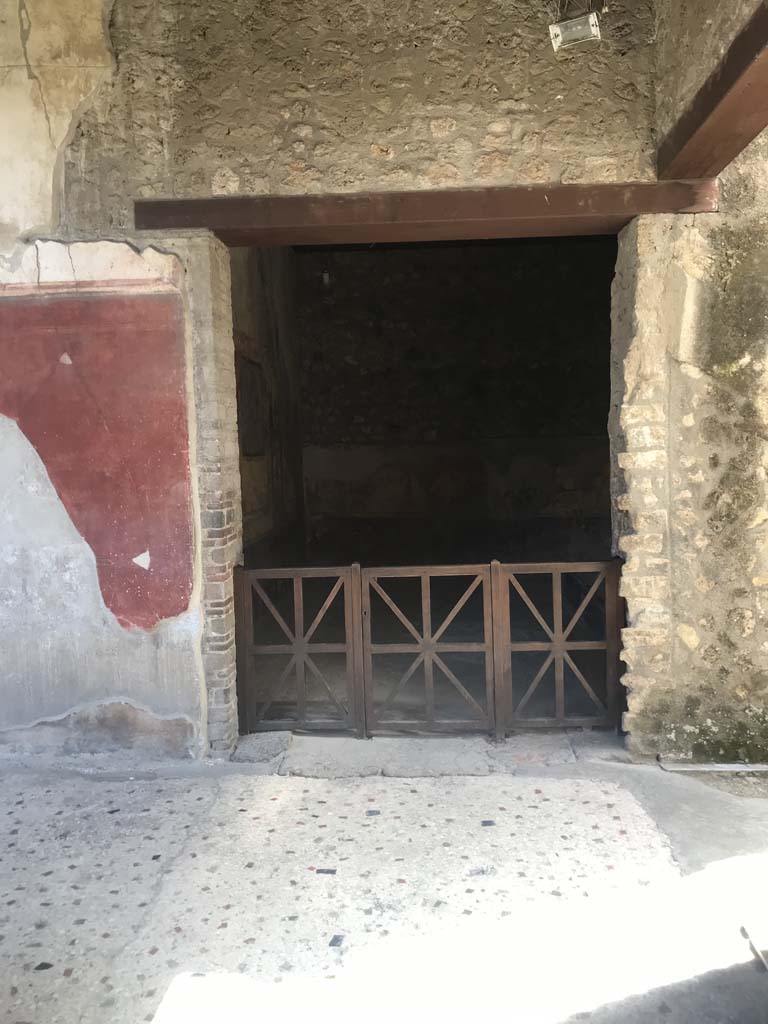 I.10.4 Pompeii. April 2019. Room 19, doorway to room on east side of portico.
Photo courtesy of Rick Bauer.
