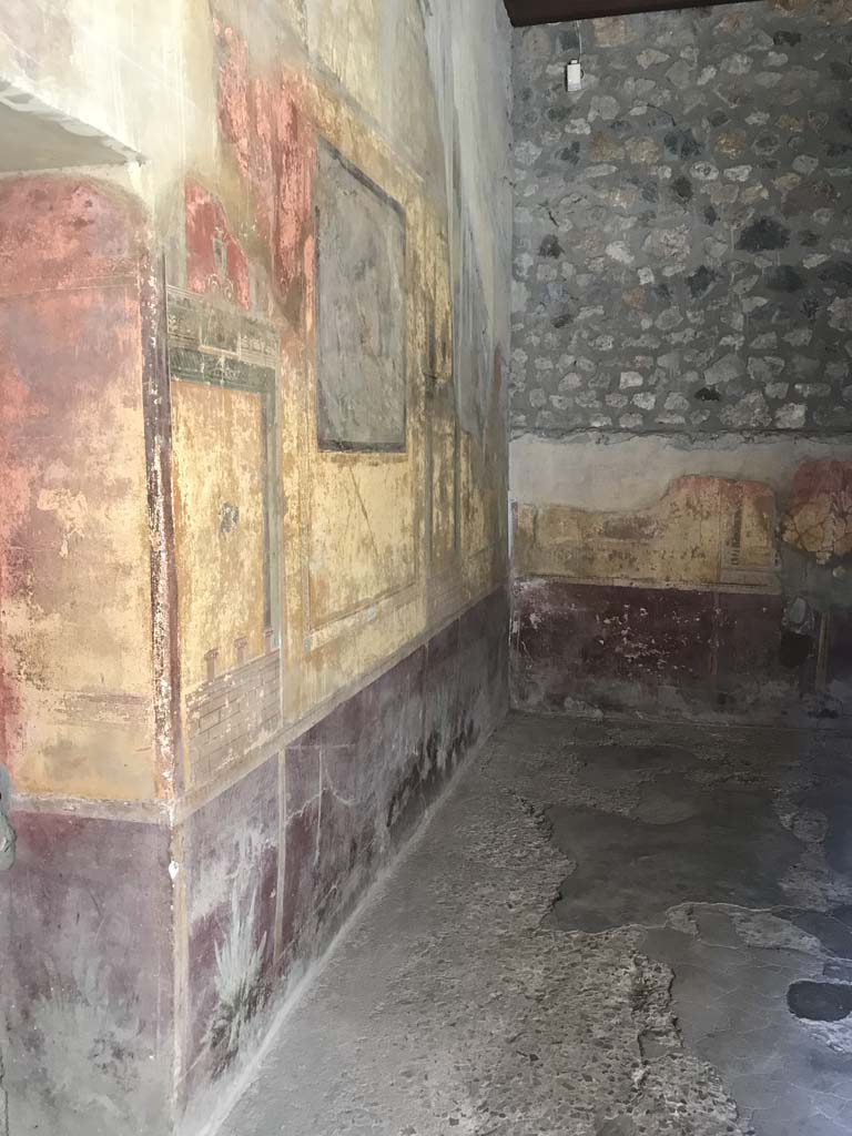 I.10.4 Pompeii. April 2019. Room 19, looking east along north wall to north-east corner.
Photo courtesy of Rick Bauer.
