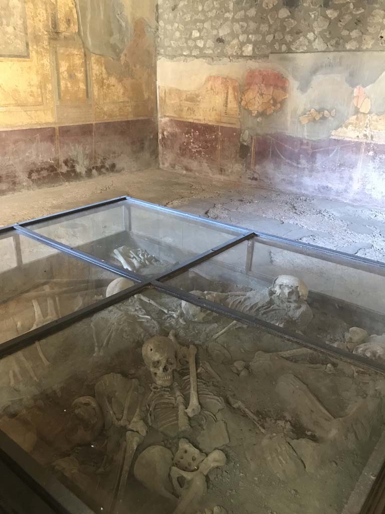 I.10.4 Pompeii. April 2019. Room 19, looking east along north wall to north-east corner.
Photo courtesy of Rick Bauer.
