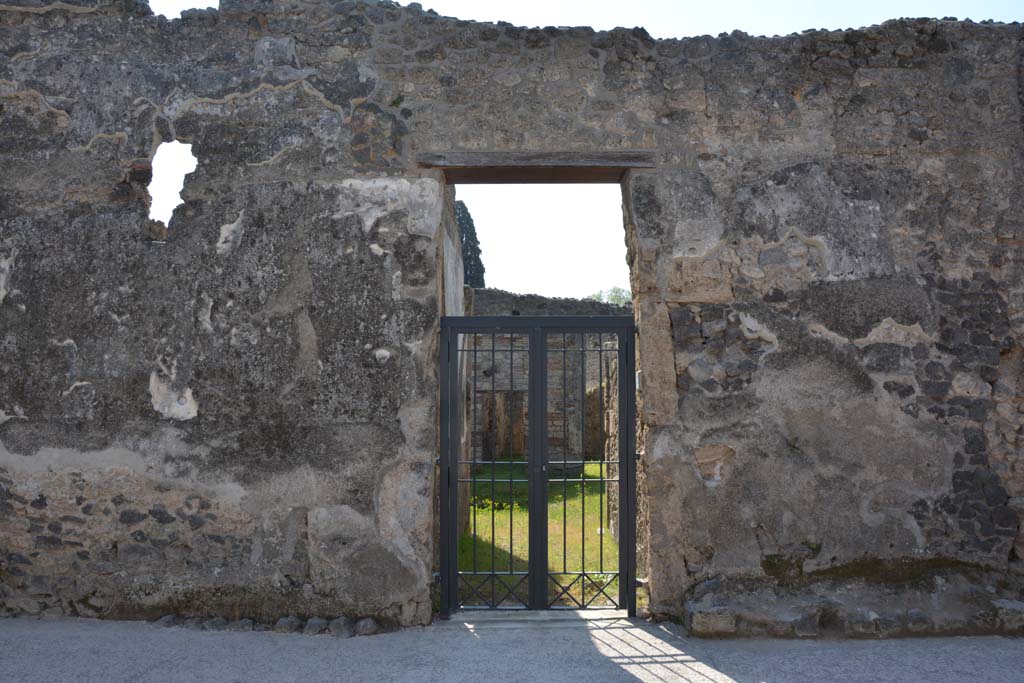 I.10.8 Pompeii. April 2017. Entrance doorway, with remains of benches on either side. Photo courtesy Adrian Hielscher.