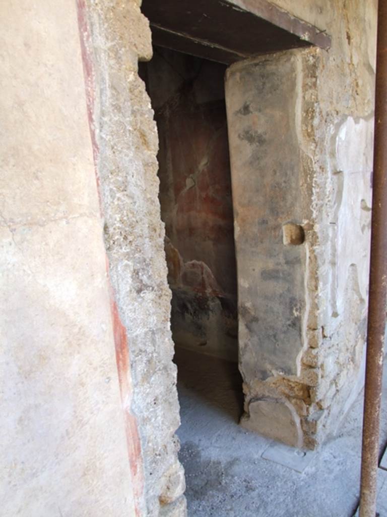 I.10.11 Pompeii.  March 2009.  Room 12.  Cubiculum on east wall of peristyle.  Doorway.