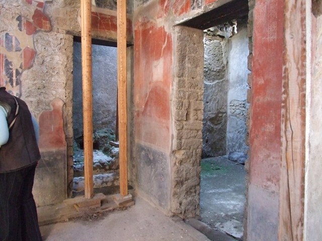 I.10.11 Pompeii. March 2009. 
Room 2, south-west corner of atrium, looking towards doorway to room 3, on south side of entrance corridor.  
